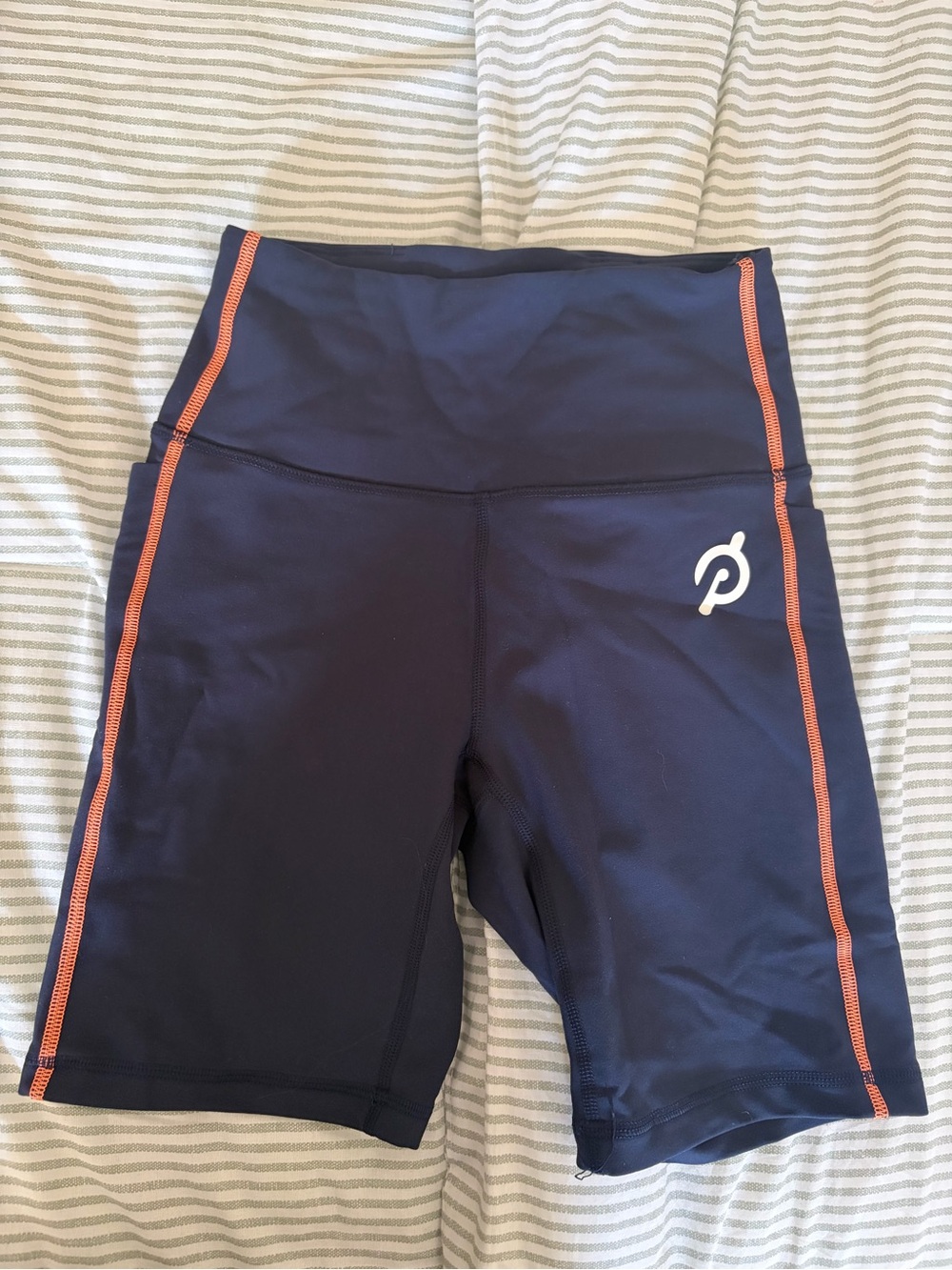 Peloton Navy Bike Shorts with Orange Side Trim